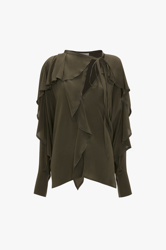 Tie Detail Ruffle Blouse in Oregano by Victoria Beckham with long sleeves, featuring layered ruffles and a keyhole neckline, pairs elegantly with double pleat trousers.