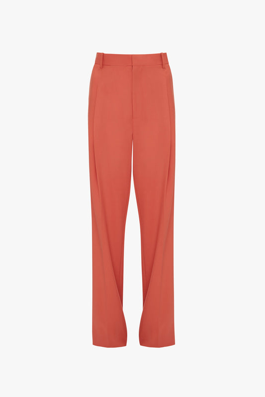 A pair of the Victoria Beckham Single Pleat Trouser In Papaya featuring a single front pleat and belt loops.