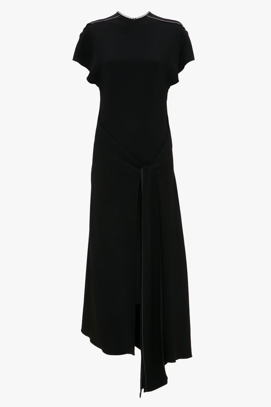 Short-Sleeve Tie Detail Dress In Black by Victoria Beckham, displayed on a white background.