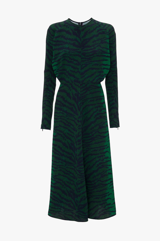 Victoria Beckham's Dolman Midi Dress In Green-Navy Tiger Print with long sleeves and a knee-length skirt, isolated on a white background.