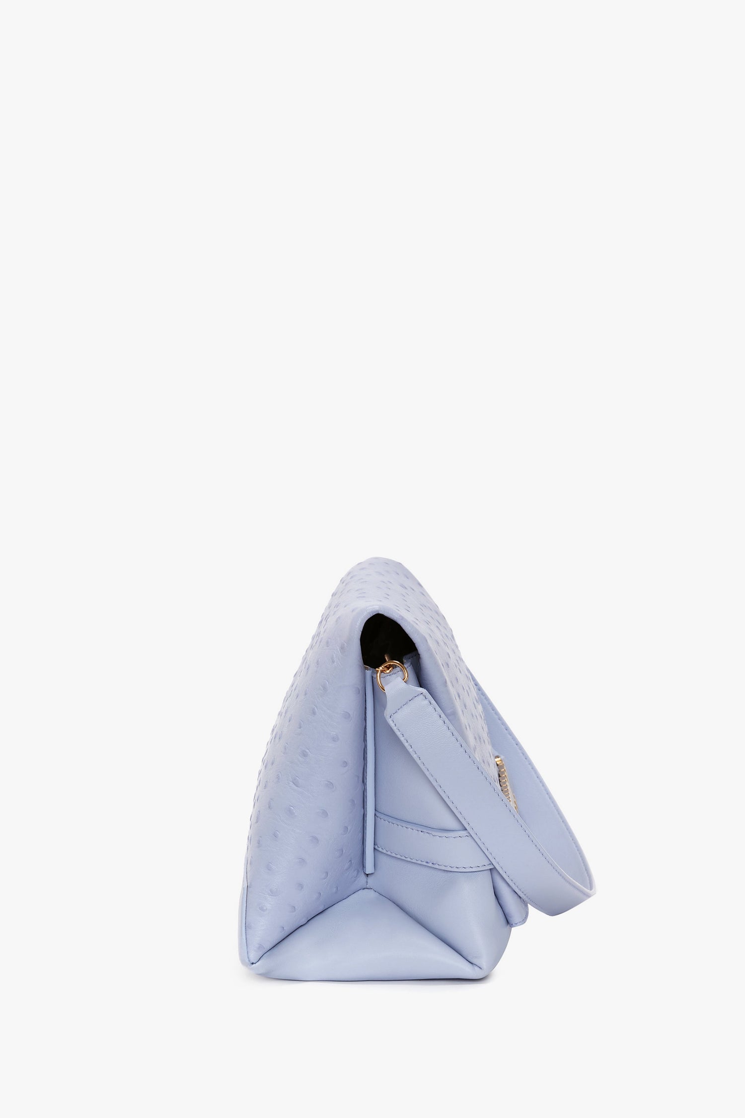 Side view of a light blue, textured Victoria Beckham Chain Pouch Bag With Strap In Frost Ostrich-Effect Leather with an embossed ostrich-effect leather pouch and gold chain detail against a plain white background.