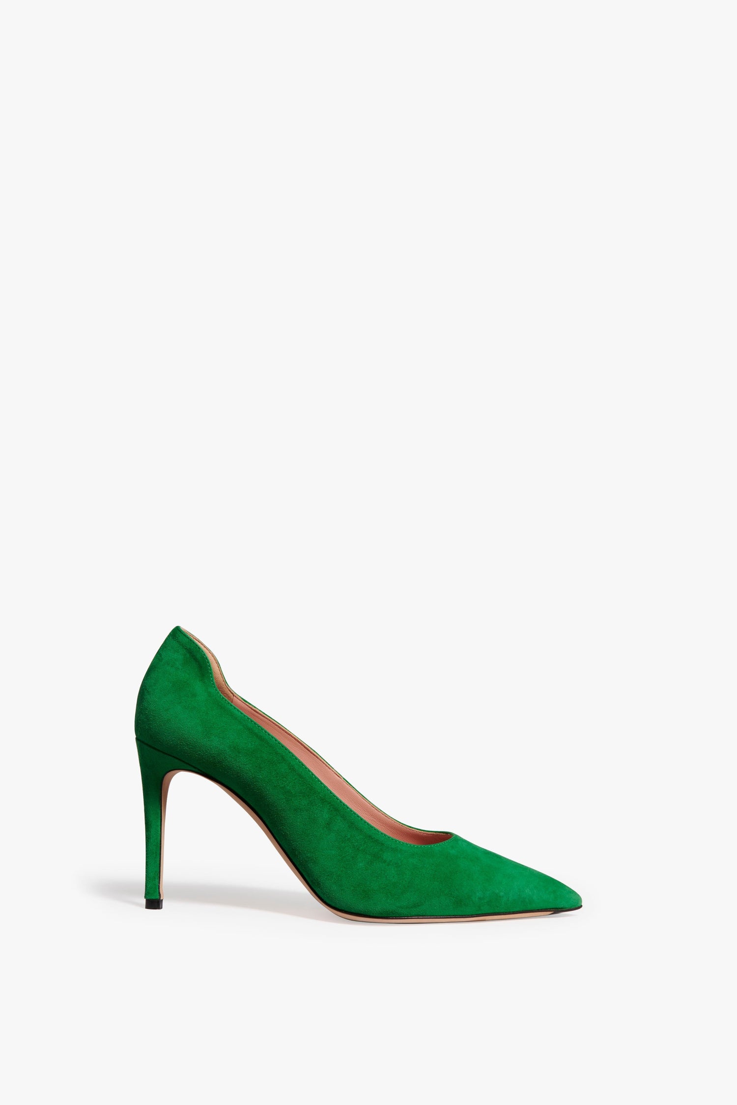 The VB Pump 90 in emerald green suede is finished with a sharp, versatile, thin heel. With a pointed toe design, this classic style is from the Victoria Beckham Footwear collection. The perfect closed-toe, thin heels for work and beyond.