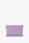 A rectangular Chain Pouch Bag with Strap in Lilac Suede by Victoria Beckham, viewed from the front against a white background, featuring a detachable strap.