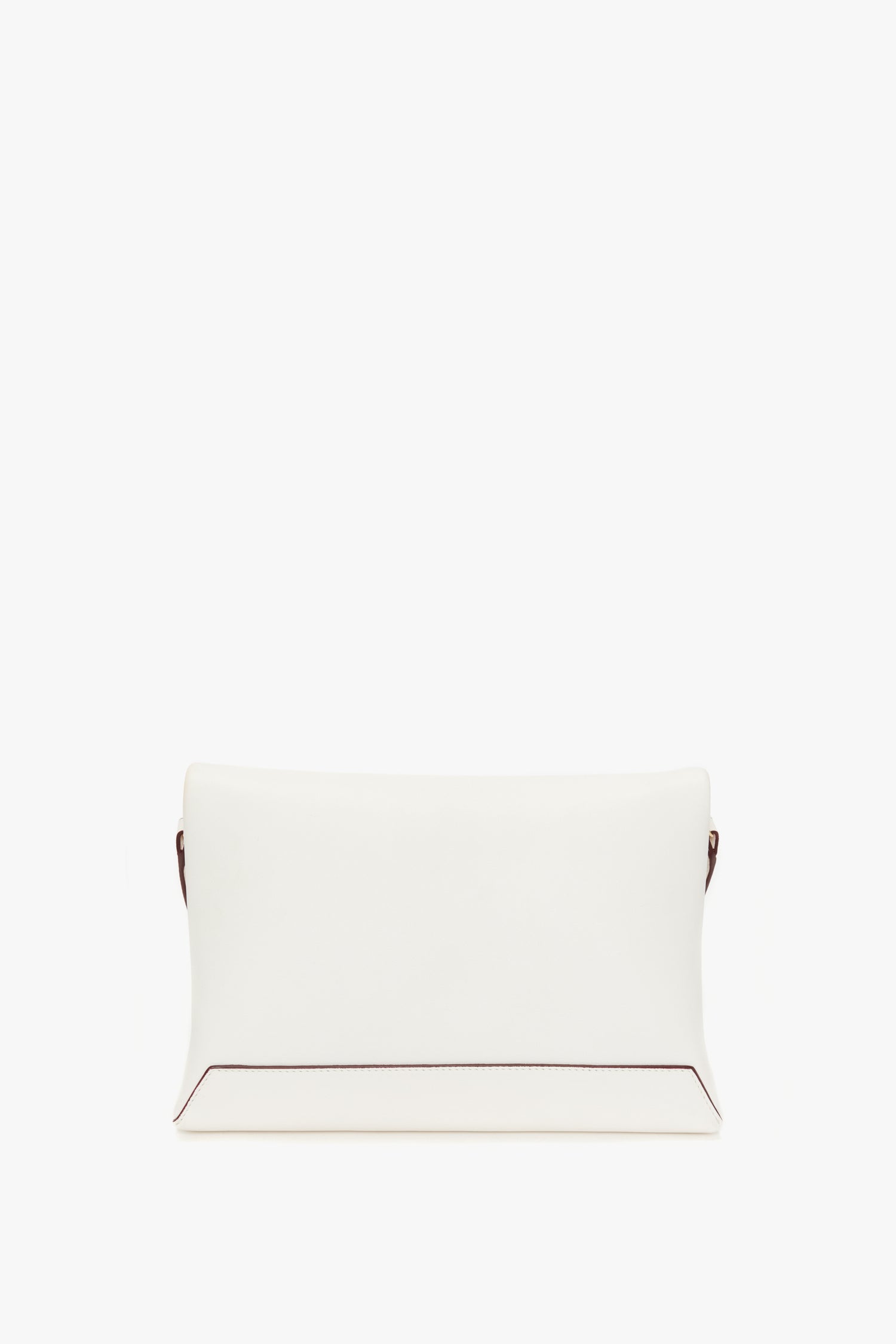 A Victoria Beckham Chain Pouch with Strap In White Leather with a minimalistic design and subtle brown accents at the edges, isolated on a white background.