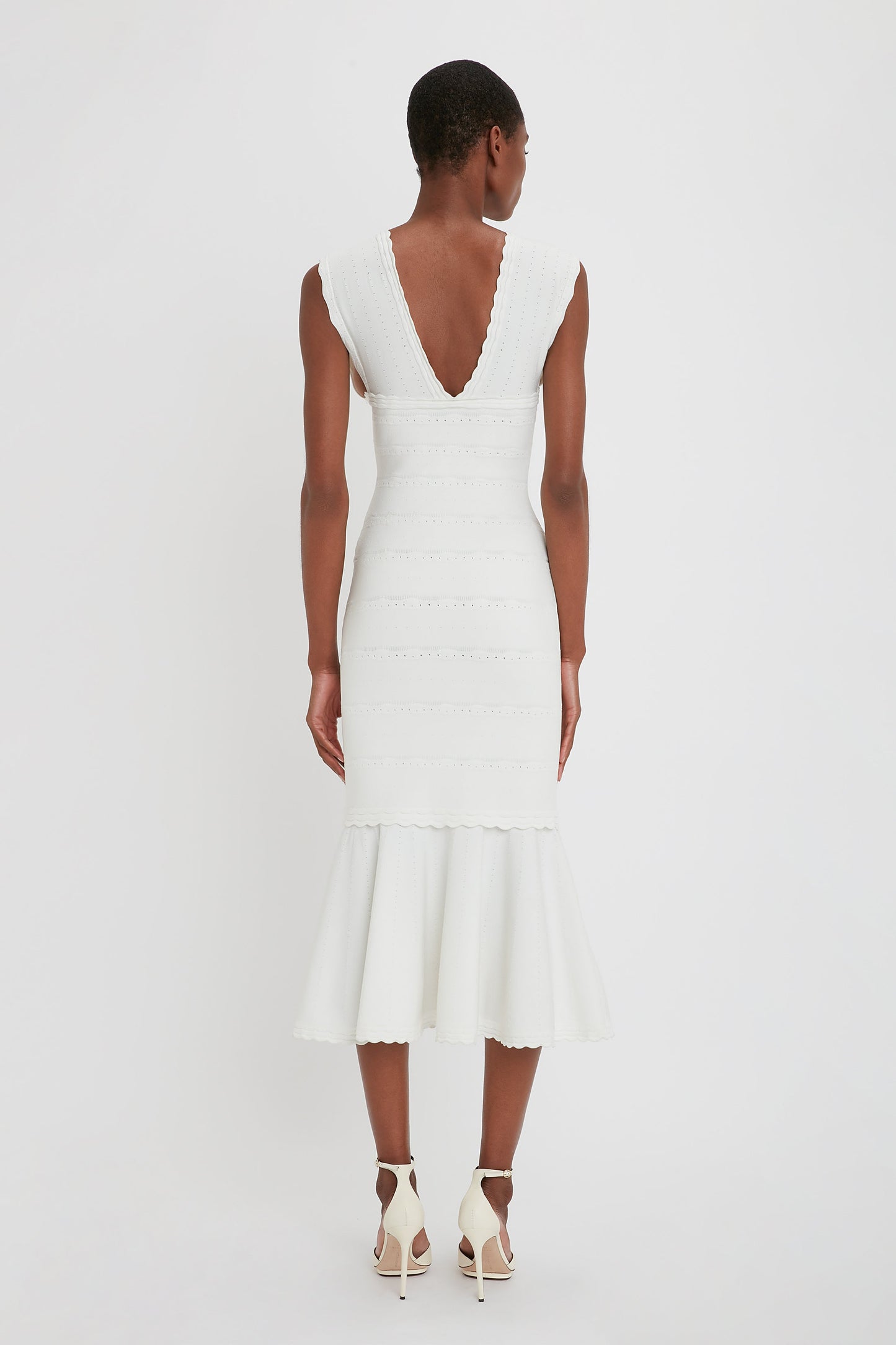 Stretch Knit Sleeveless Flared Dress In White