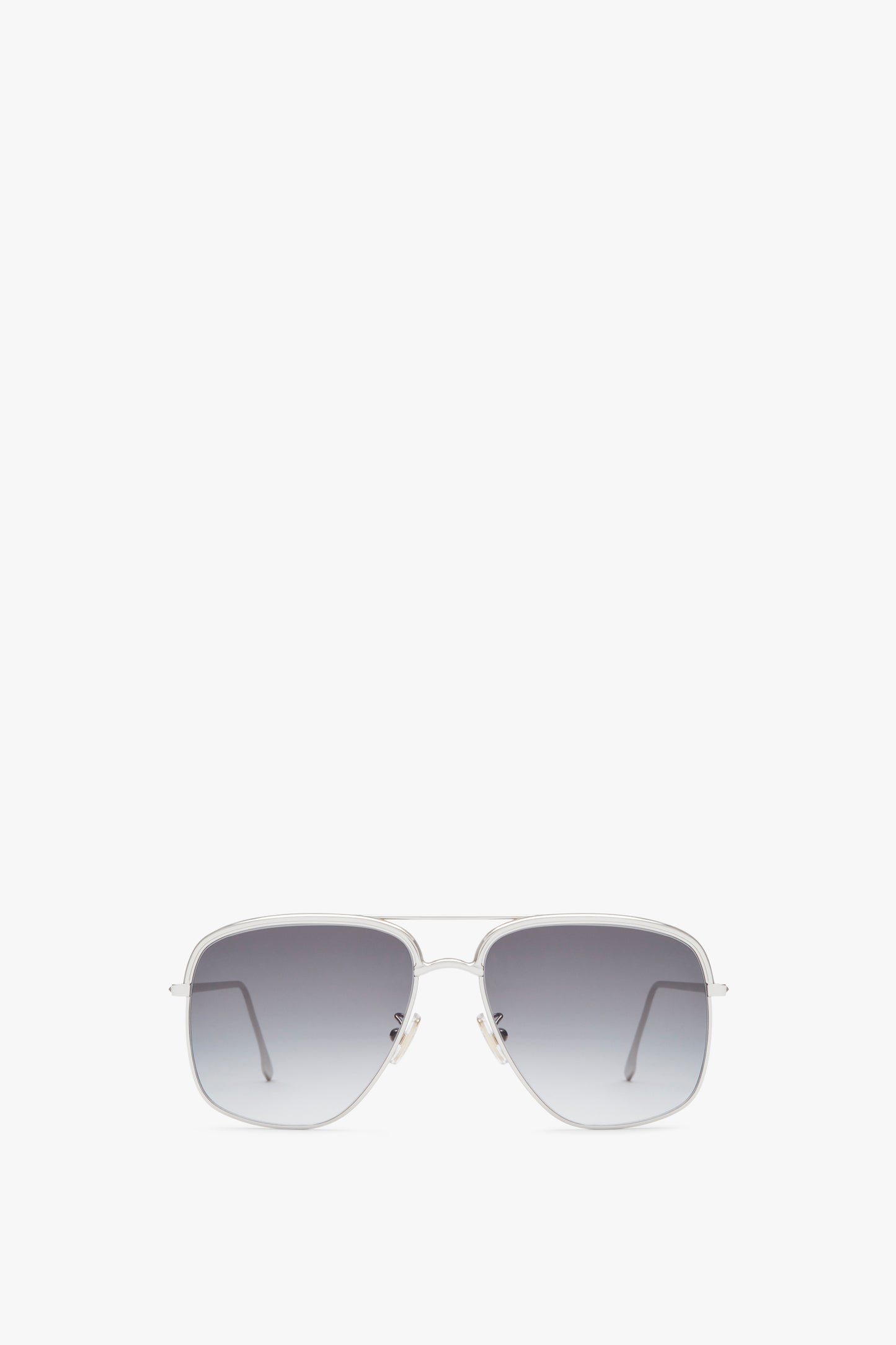 A pair of Double Brow Navigator in Silver with gradient Zeiss lenses and a metal frame by Victoria Beckham, handcrafted in Italy, shown on a white background.